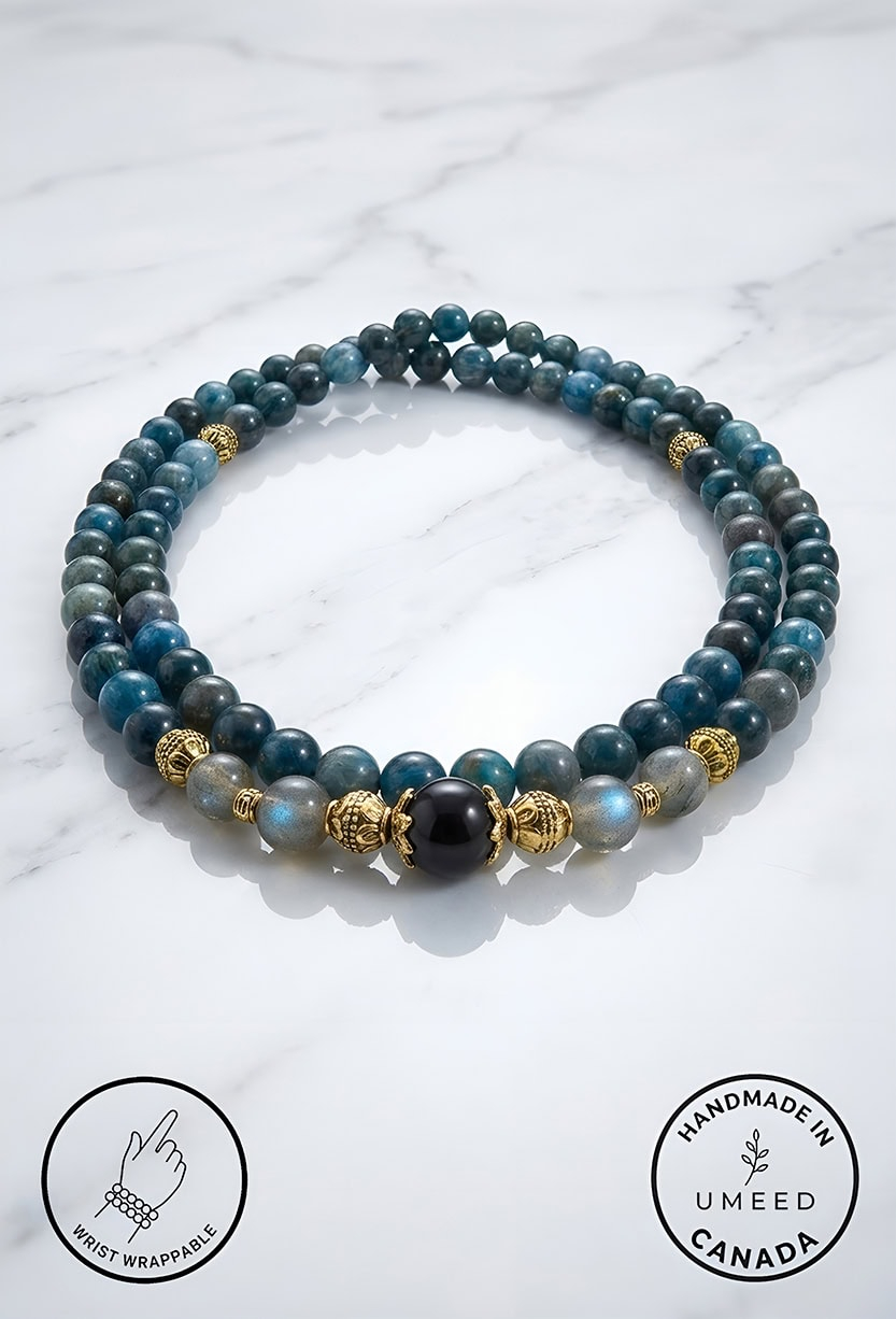 Blue and black beaded bracelet with gold accents, handmade jewelry from Umeed Designs.