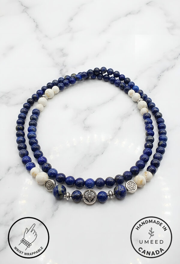 Elegant handmade blue and white beaded necklace from Umeed Designs.