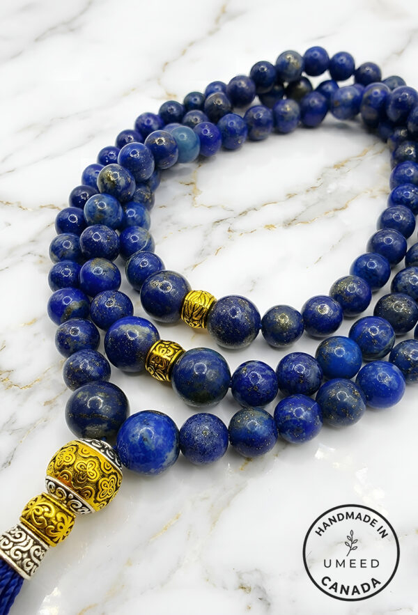 Elegant blue lapis lazuli beaded necklace with gold accents from Umeed Designs.