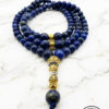 Elegant blue gemstone beaded necklace with gold accents from Umeed Designs.