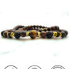 Handmade wooden beaded bracelet with black and brown beads and gold accents.