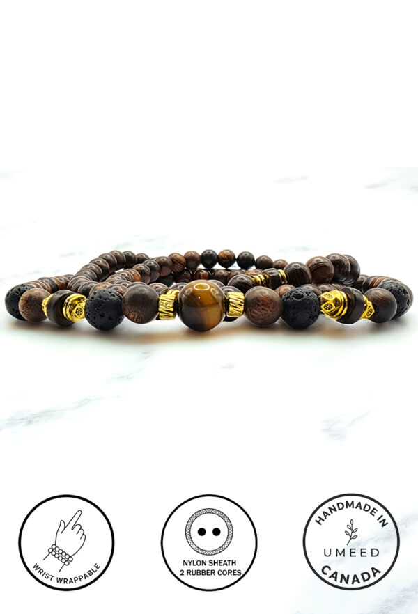 Handmade wooden beaded bracelet with black and brown beads and gold accents.