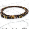 Elegant handmade beaded necklace with wooden and gold accents from Umeed Designs.