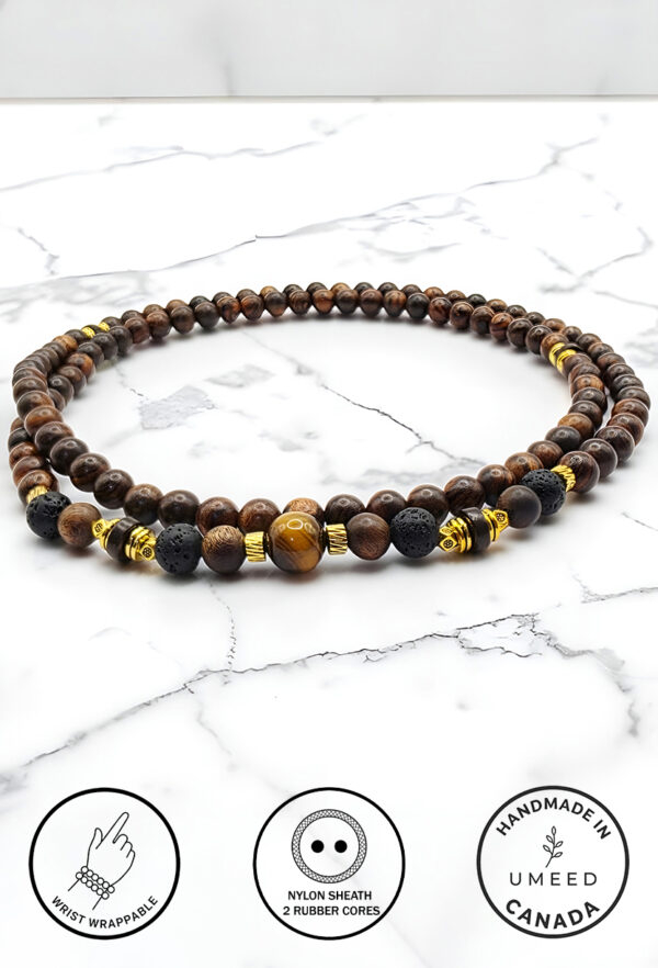Elegant handmade beaded necklace with wooden and gold accents from Umeed Designs.