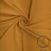 Golden fabric with subtle glitter and light weight label from Umeed Designs.