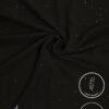 Black fabric with gold specks, lightweight and non-slip for elegant drapes.