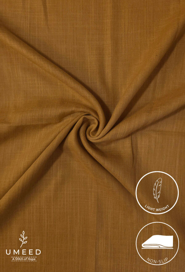 Lightweight, non-slip fabric in warm brown color for clothing or accessories.