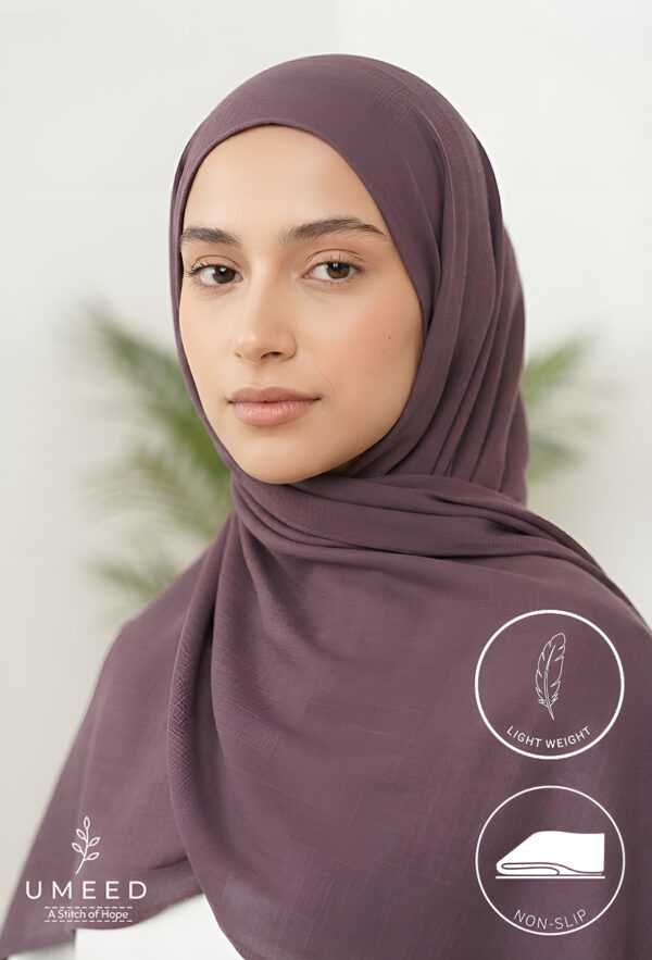 Elegant woman wearing a lightweight, non-slip hijab from Umeed Designs.