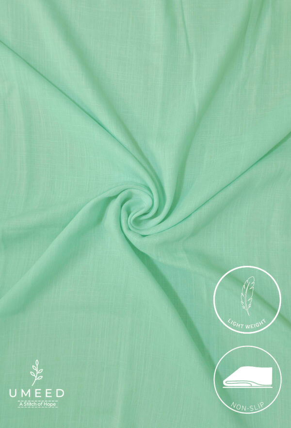 Lightweight, non-slip mint green fabric from Umeed Designs.