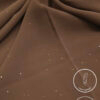 Lightweight, non-slip brown fabric with gold specks for elegant fashion design.