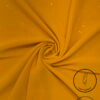Bright yellow fabric with subtle glitter and light weight design for fashion or decor.