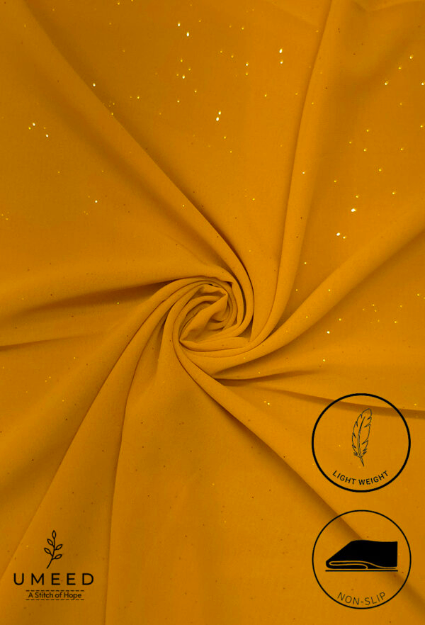 Bright yellow fabric with subtle glitter and light weight design for fashion or decor.