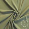 Lightweight, non-slip fabric in soft green for comfortable clothing or accessories.