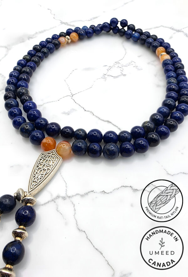 Elegant blue and orange beaded necklace with silver pendant from Umeed Designs.
