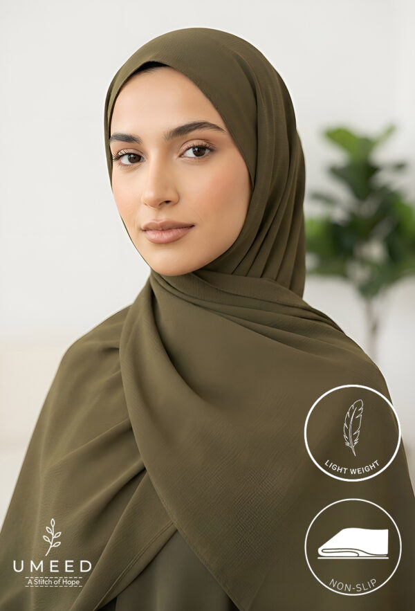 Elegant woman wearing olive green hijab with light weight and non-slip features.