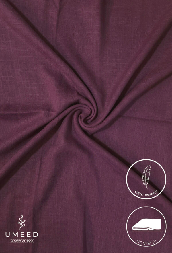 Lightweight, non-slip maroon fabric from Umeed Designs for comfortable wear.