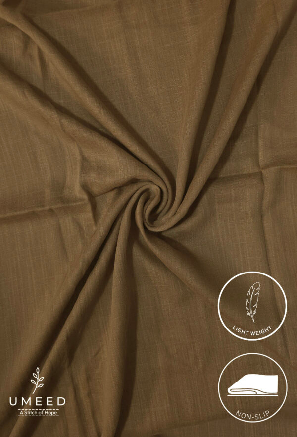 Lightweight, non-slip beige fabric with a smooth texture for upholstery or crafts.
