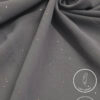 Gray fabric with small gold and silver glitter accents, lightweight and non-slip.
