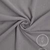 Lightweight grey fabric with subtle gold specks, ideal for elegant clothing.