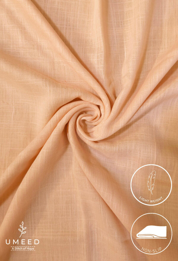 Light peach lightweight, non-slip fabric for comfortable clothing and crafts.
