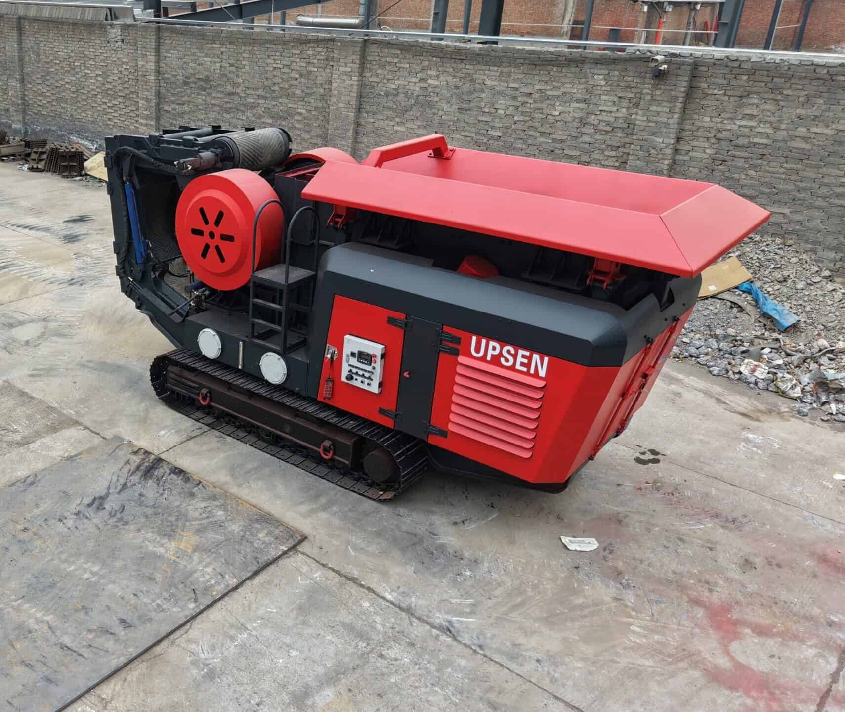 UPSEN USA-704JC ujc704 jaw crusher crushing concrete debris on site.