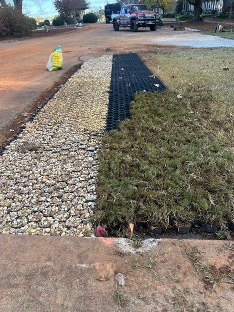 Permeable grass and gravel grid system being installed at the UGA Green Stormwater Infrastructure demo site
