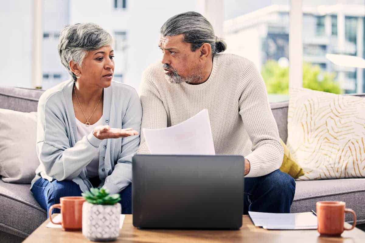 A couple discussing what questions to ask their insurance agent