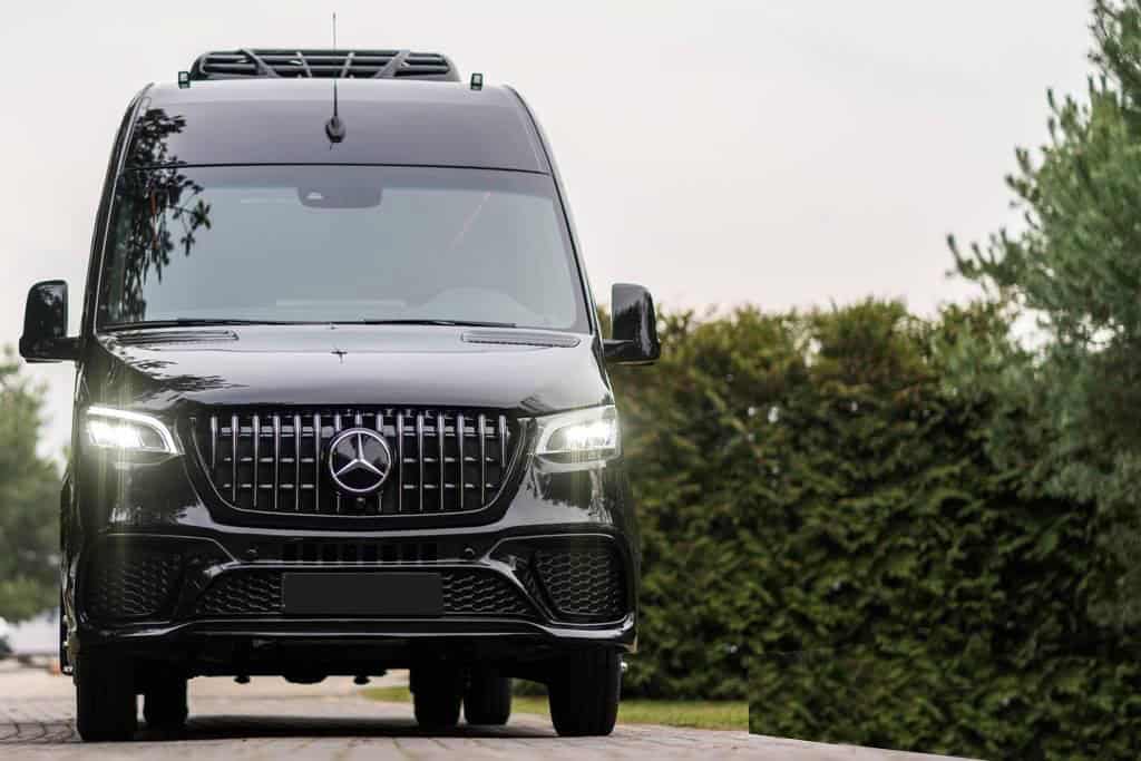 Black Mercedes-Benz luxury van, front view