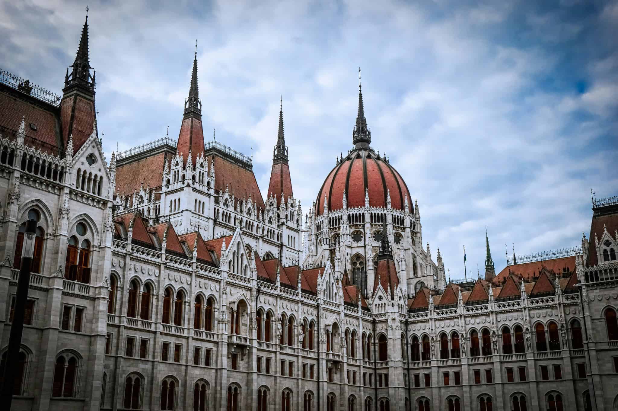 Budapest Parliament Building iconic Gothic architecture with red dome and spires, Hungary landmark