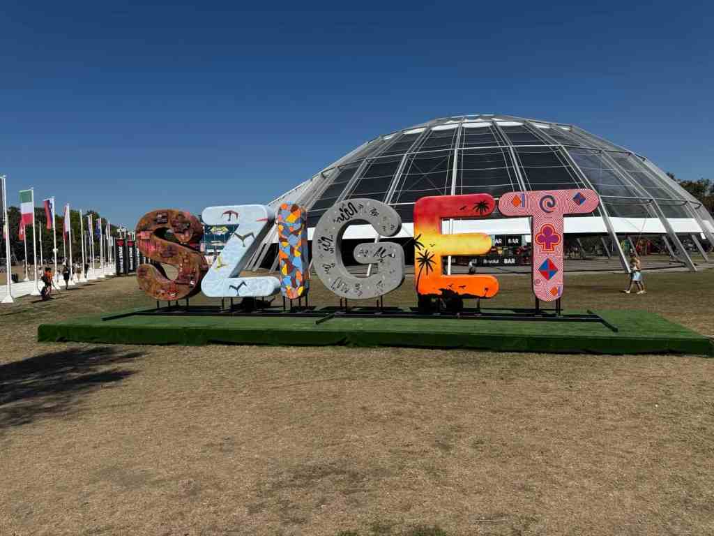 Visitors arriving at the colorful Sziget Festival entrance in Budapest in 2025