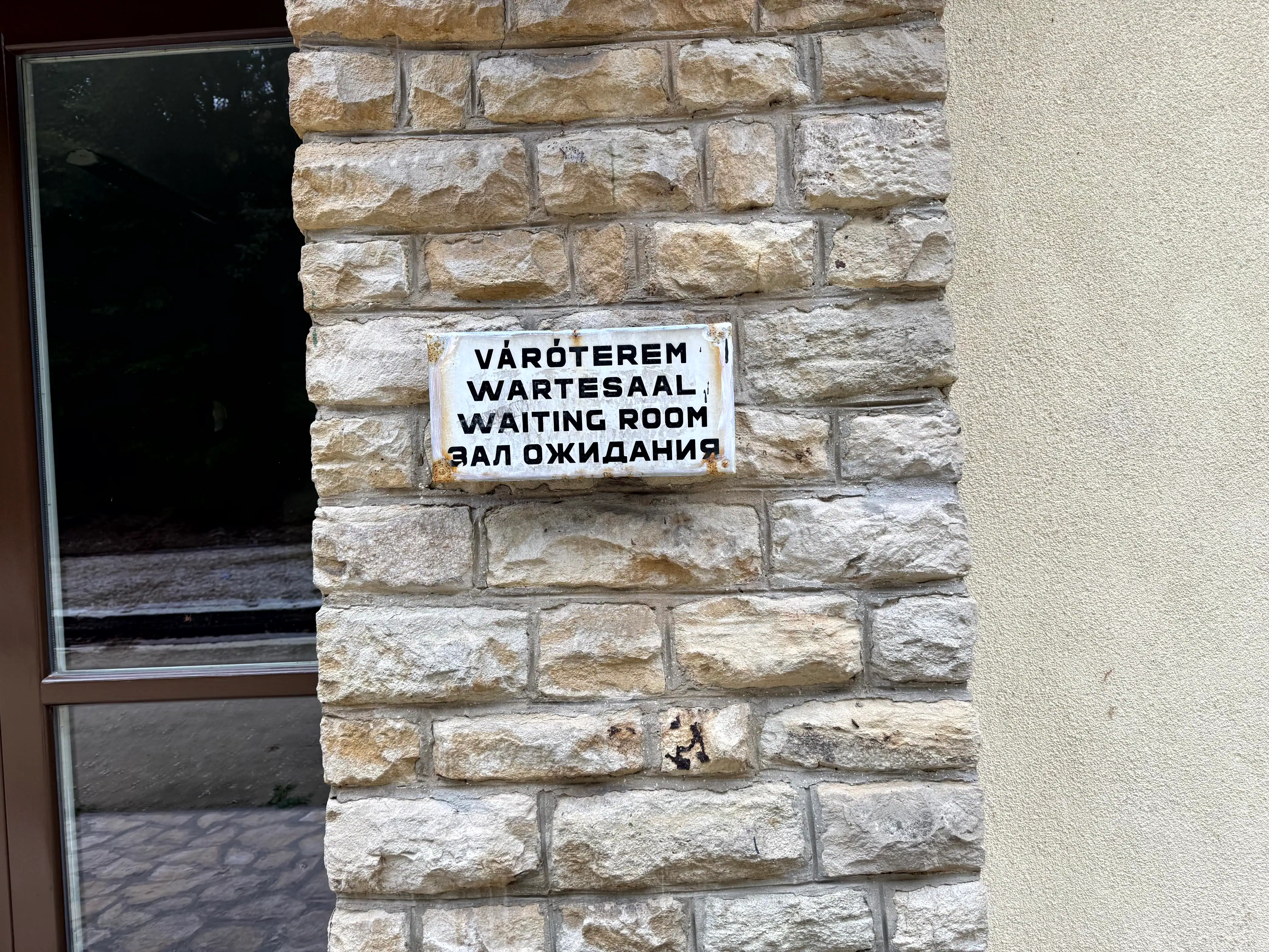 The full-length Children's Railway train crossing through the Buda Hills
