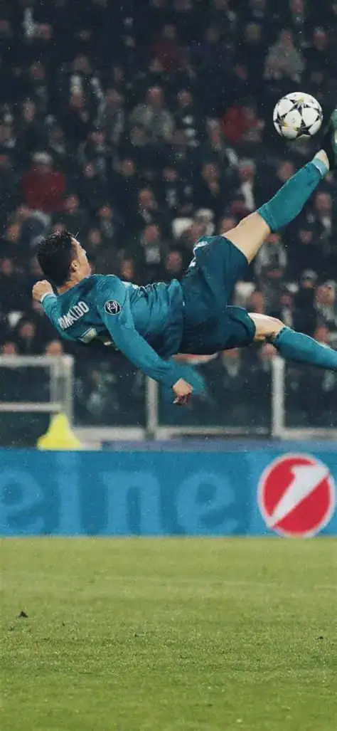 Soccer goalkeeper making a diving save during a match.