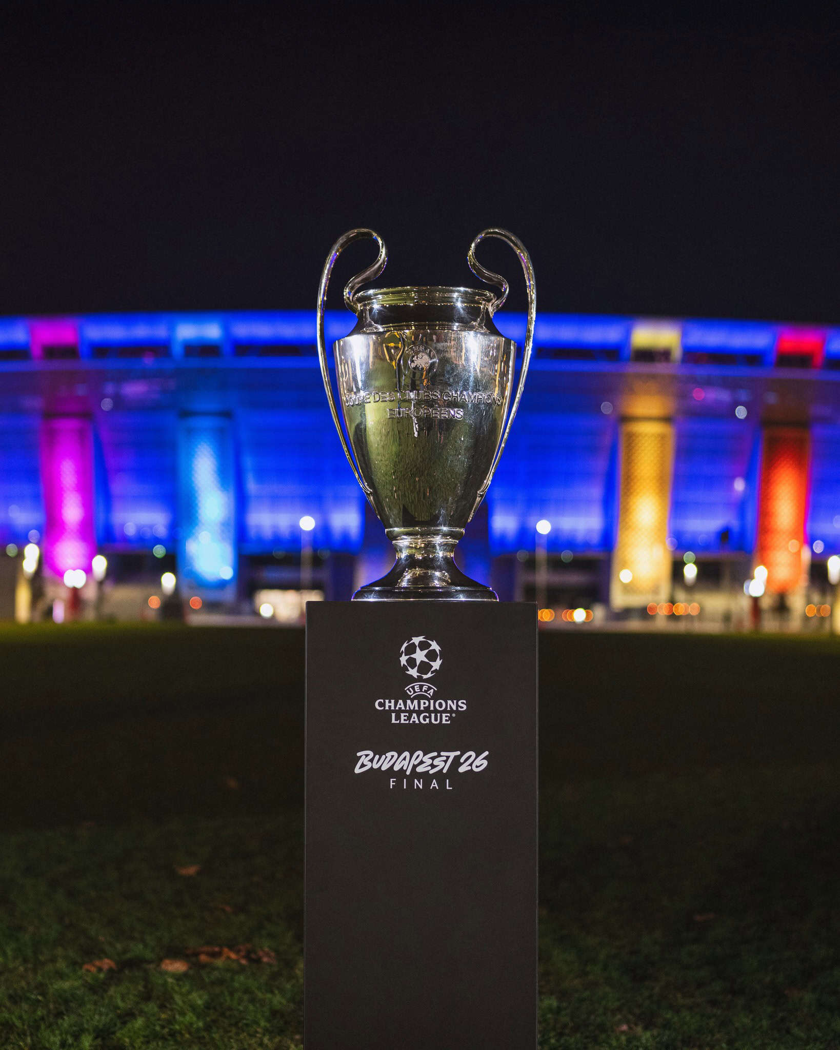 UEFA Champions League trophy on display at the Puskás Aréna pitch