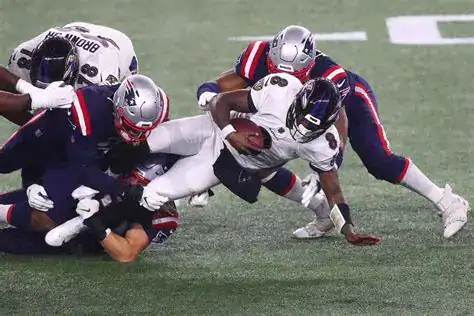 NFL tackle action during championship game