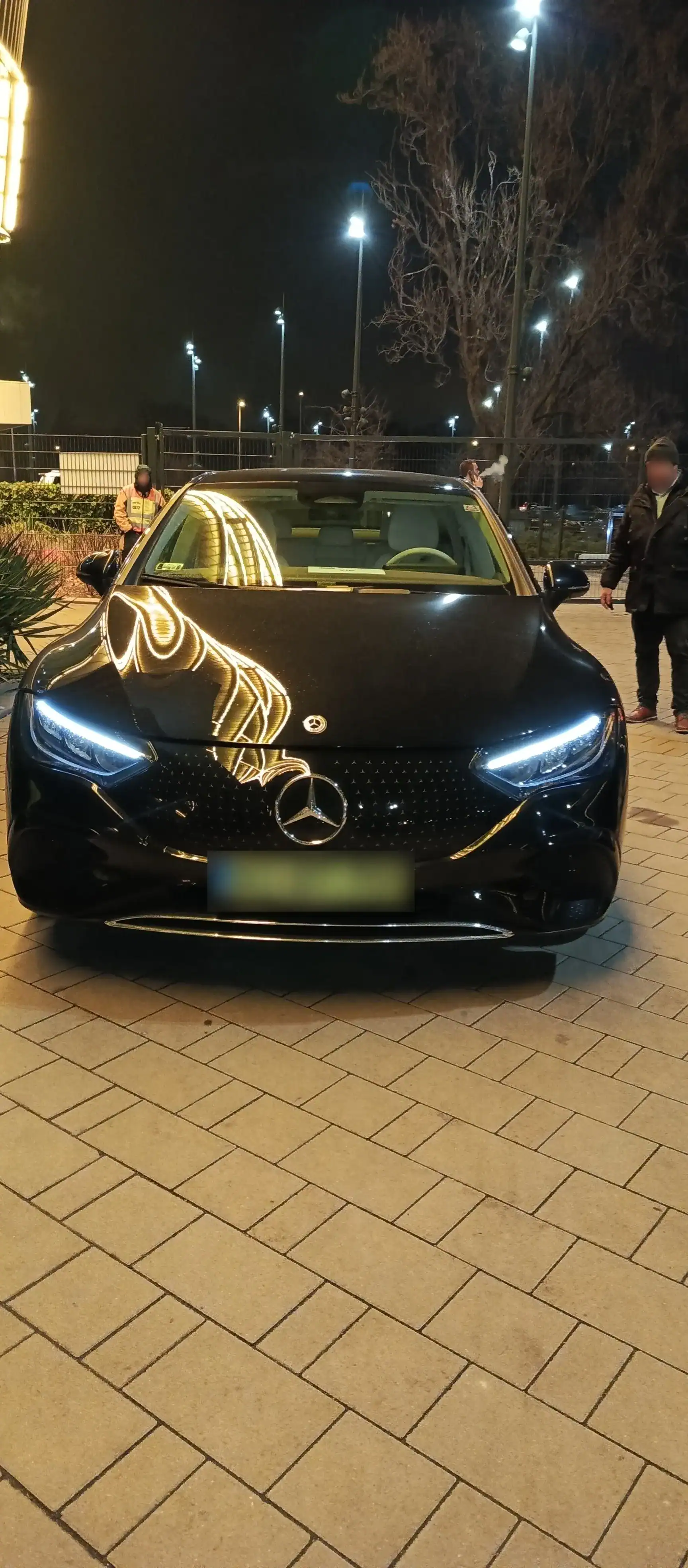 Benz luxury car at night in Budapest.
