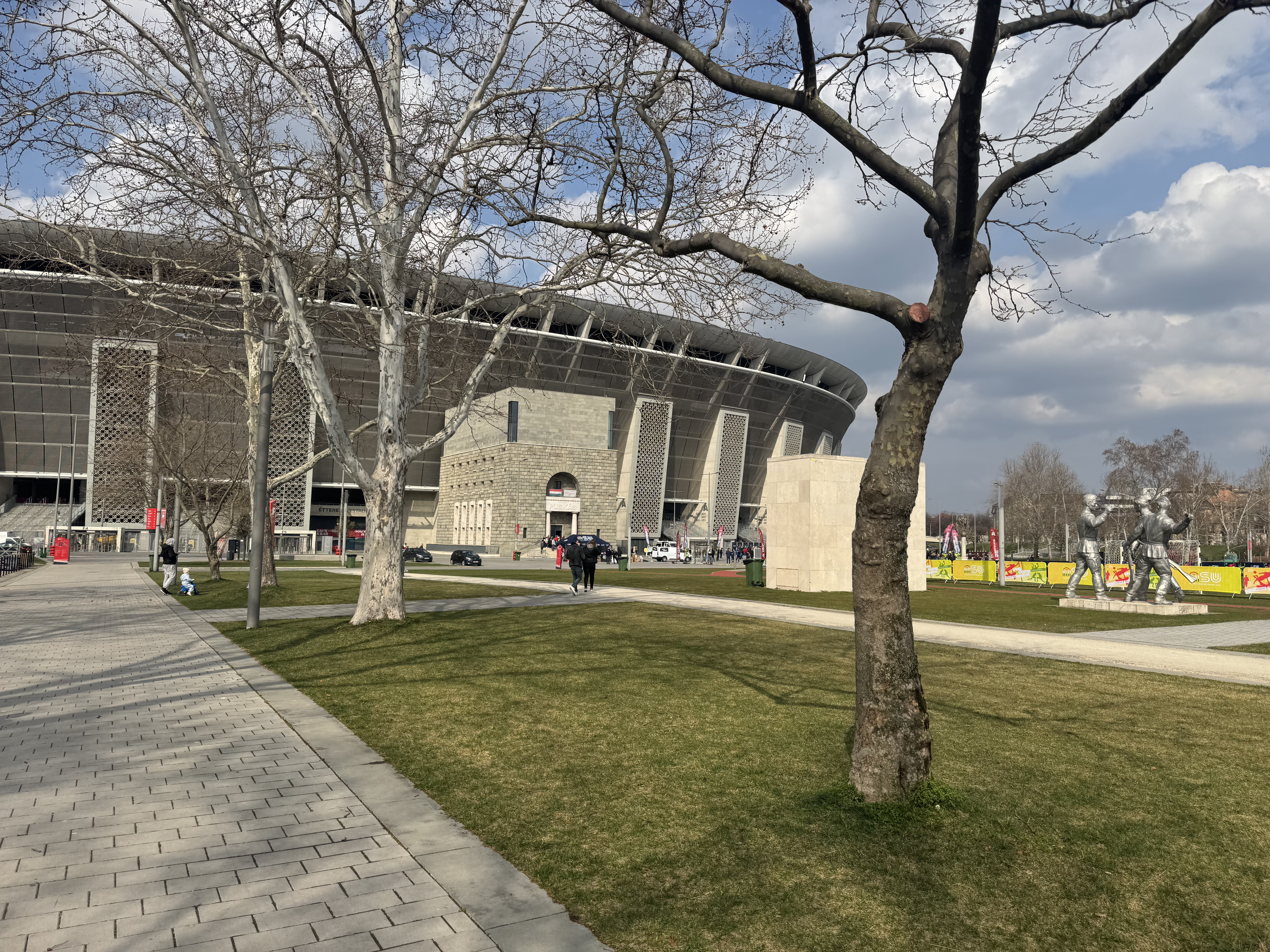 Puskás Aréna exterior at night — Budapest Champions League Final venue