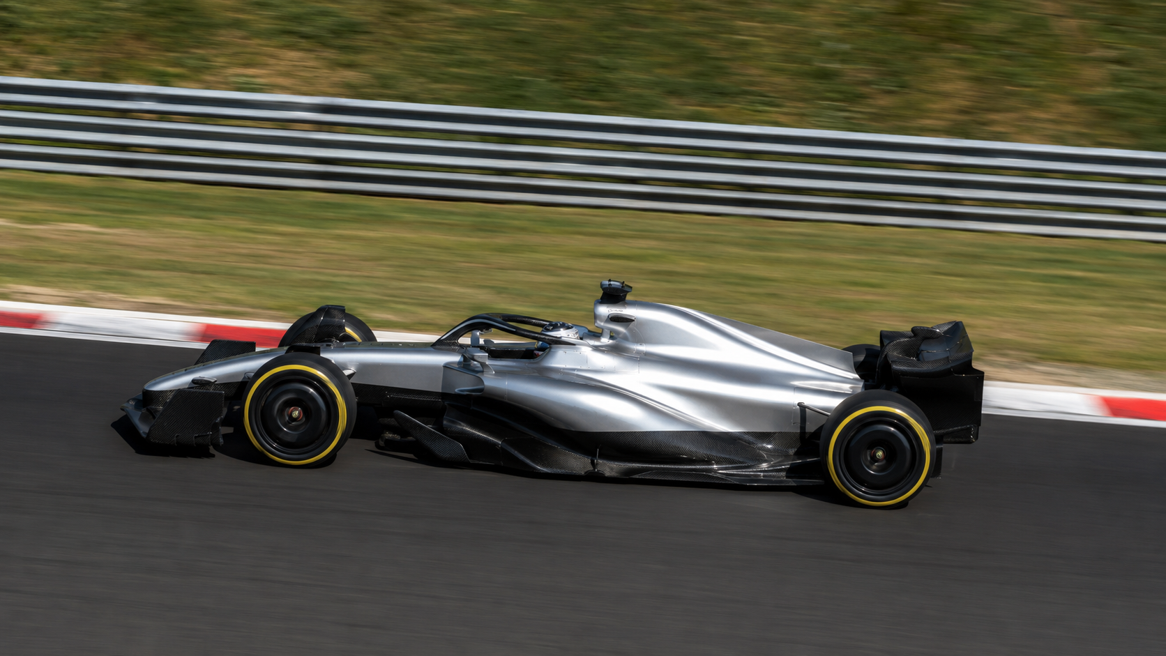 Silver Formula 1 car on track
