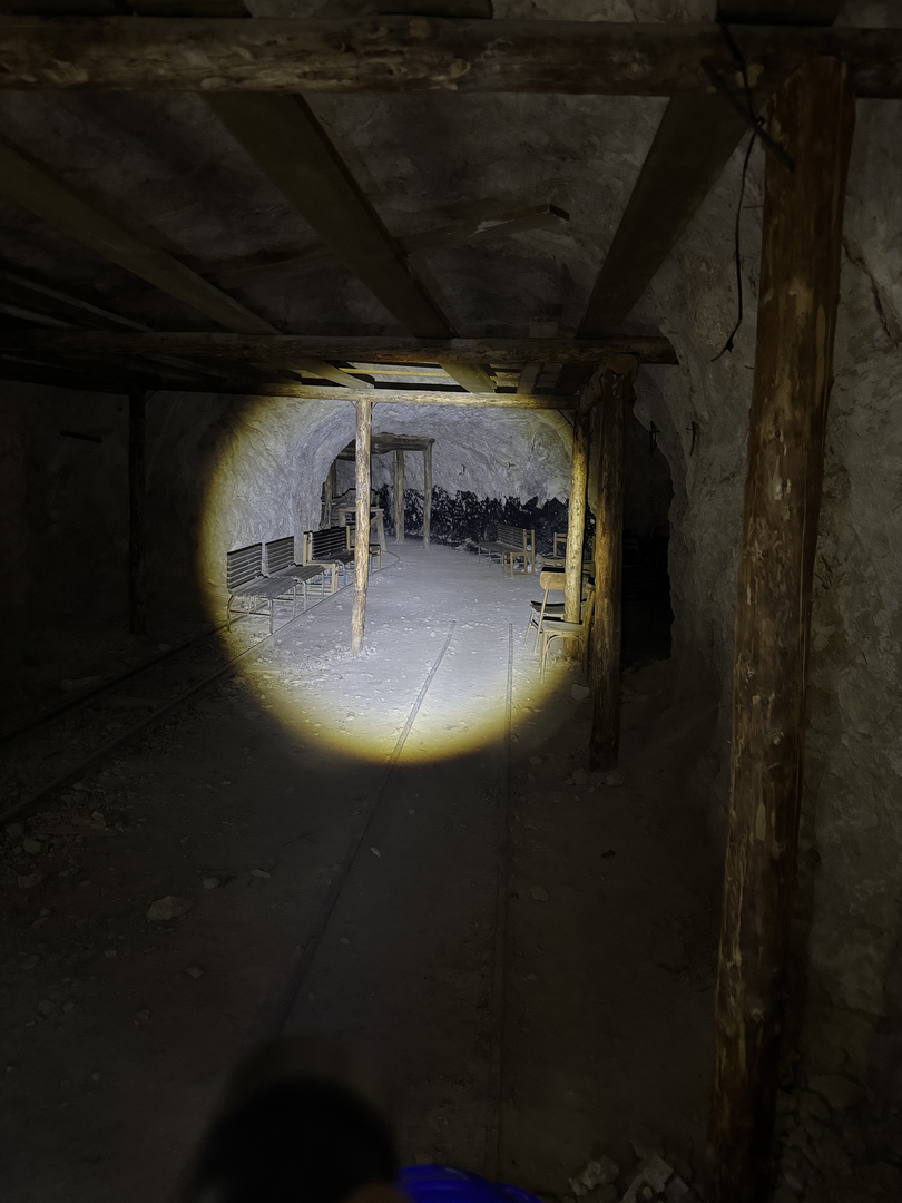 Wooden supports marching into the dark