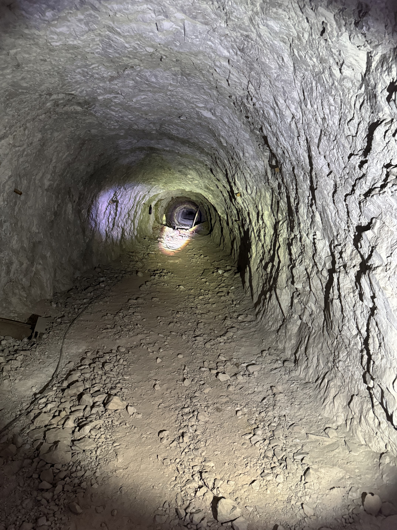 The tunnel's glowing throat