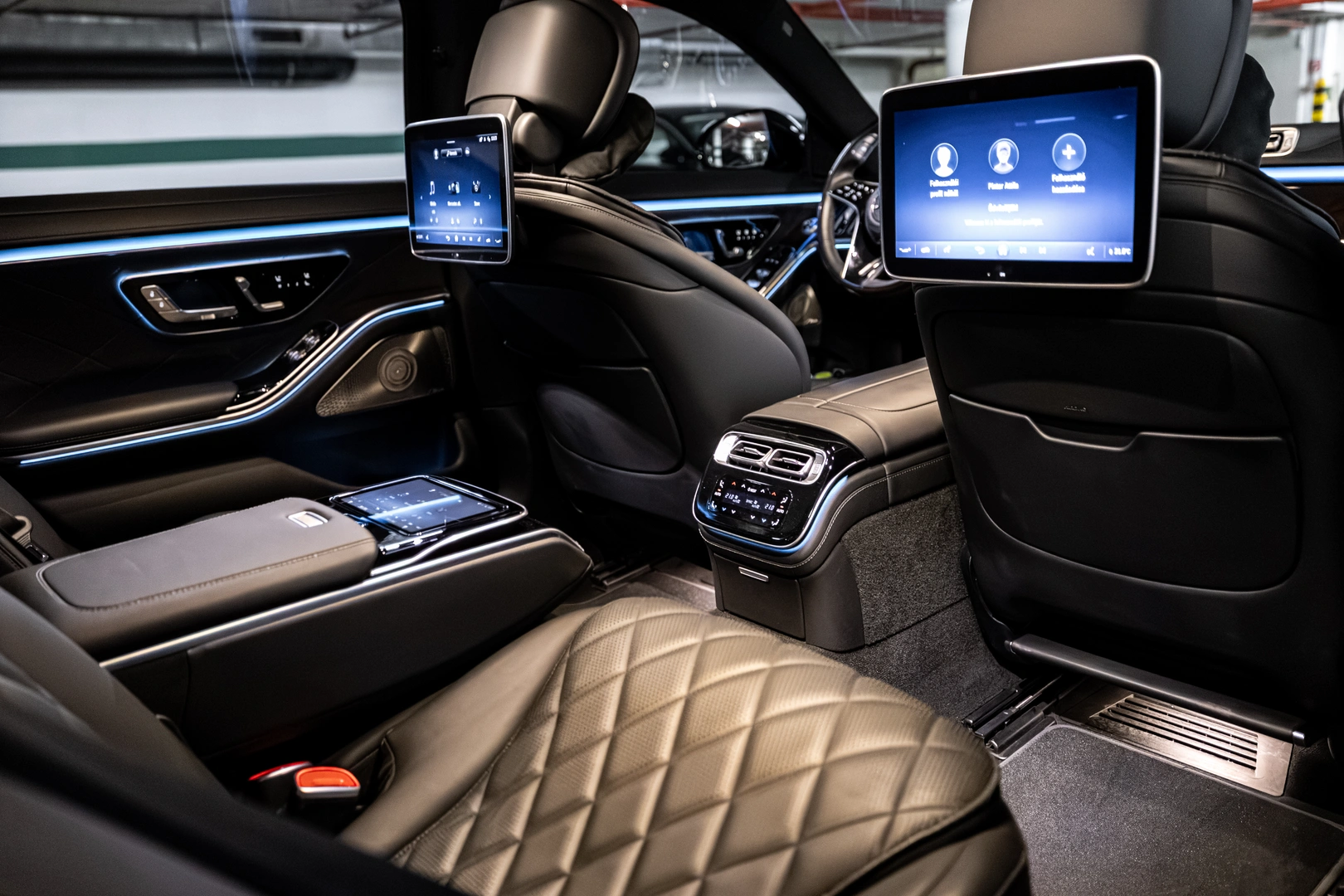 Mercedes-Benz S-Class — twin rear screens and quilted comfort.