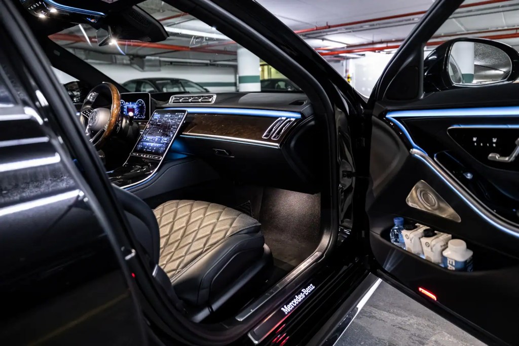 Mercedes-Benz S-Class cabin viewed through an open rear door