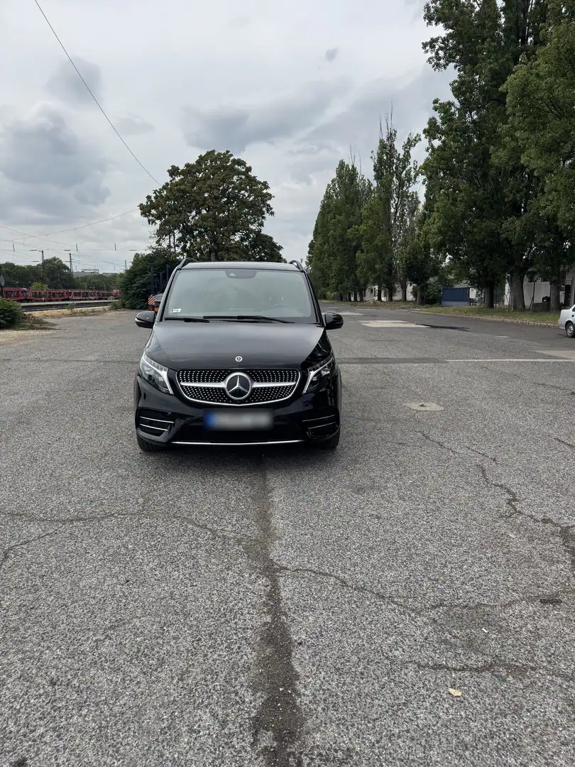 Black Mercedes V-Class parked on a Budapest street