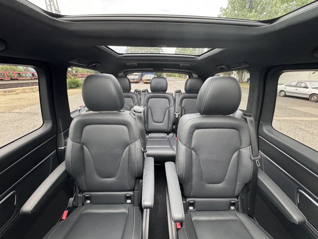 Mercedes-Benz V-Class leather passenger seats beneath a panoramic roof