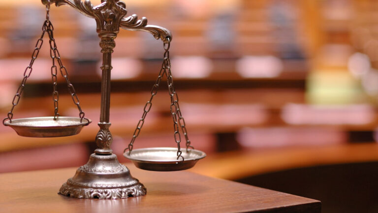 Investment loss attorney helping investor recover losses caused by broker misconduct