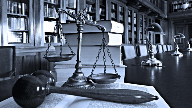Military veteran meeting with investment fraud lawyer over financial losses