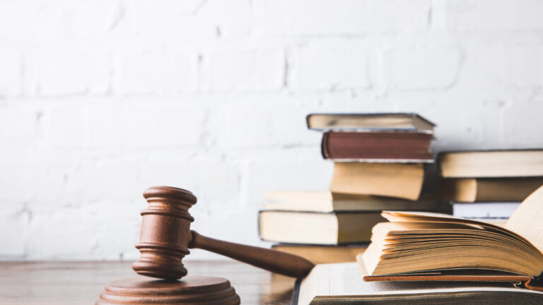 Securities lawyer reviewing Regulation Best Interest violations involving broker misconduct