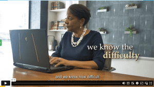 Vergena with laptop - Value-Based Healthcare Consulting Services