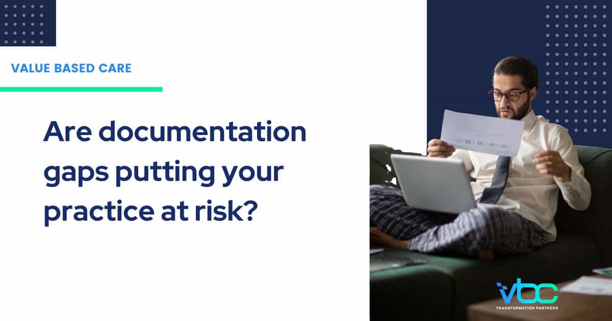 Physician completing clinical documentation in a value-based care environment.