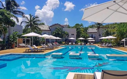 Cap Cove Beachfront 3BR—Resort-Managed, STR-Ready USD 325,000