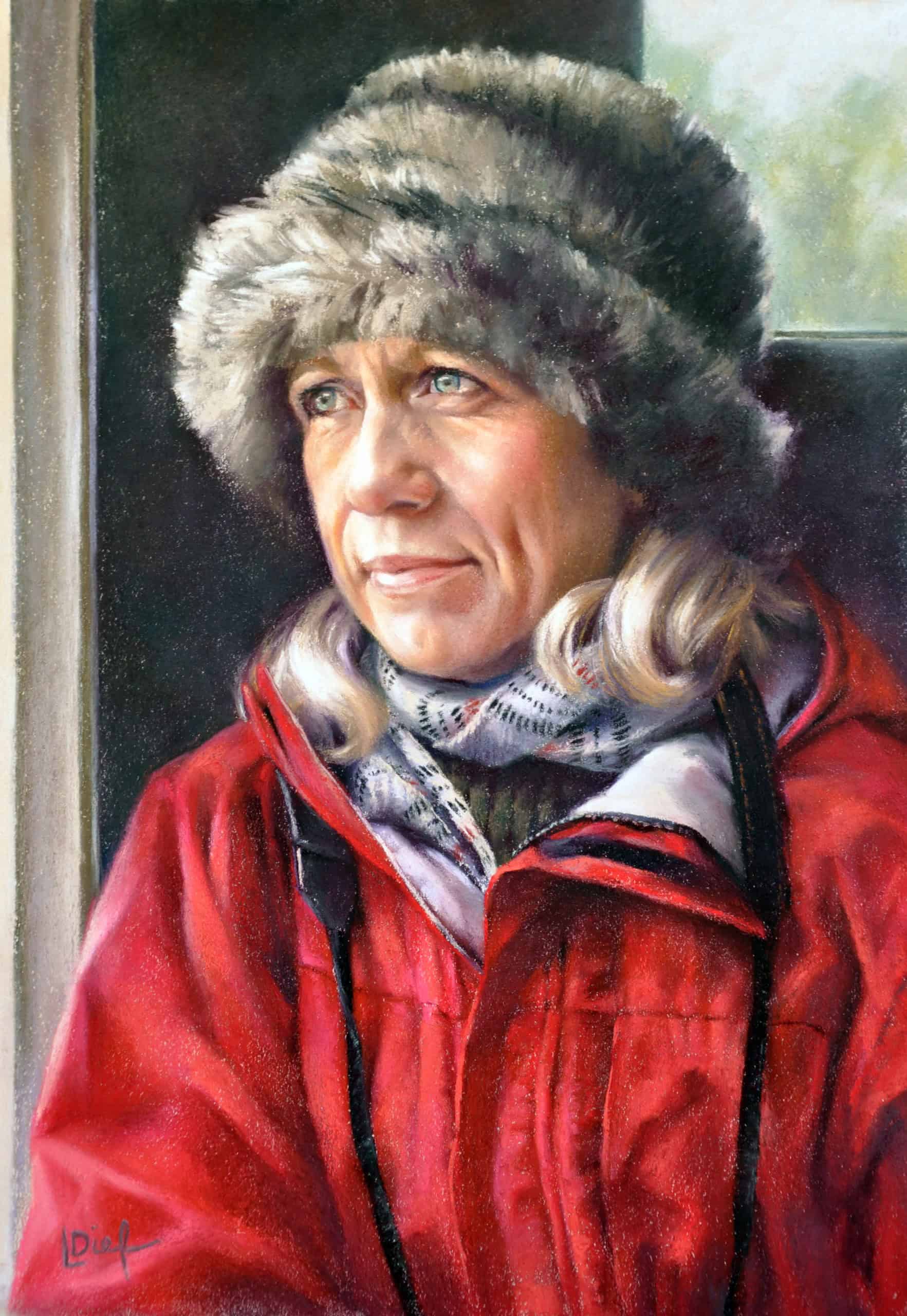 Woman in winter clothing with fur hat, red jacket, and scarf, outdoors.